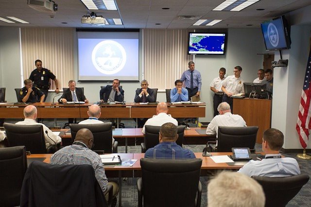 Meeting in executive group conference room.