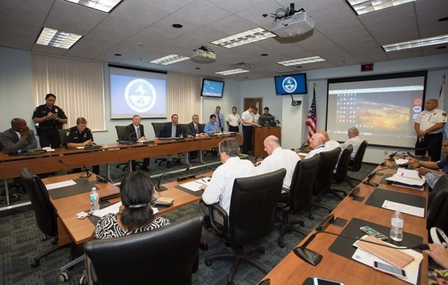Meeting in executive group conference room.